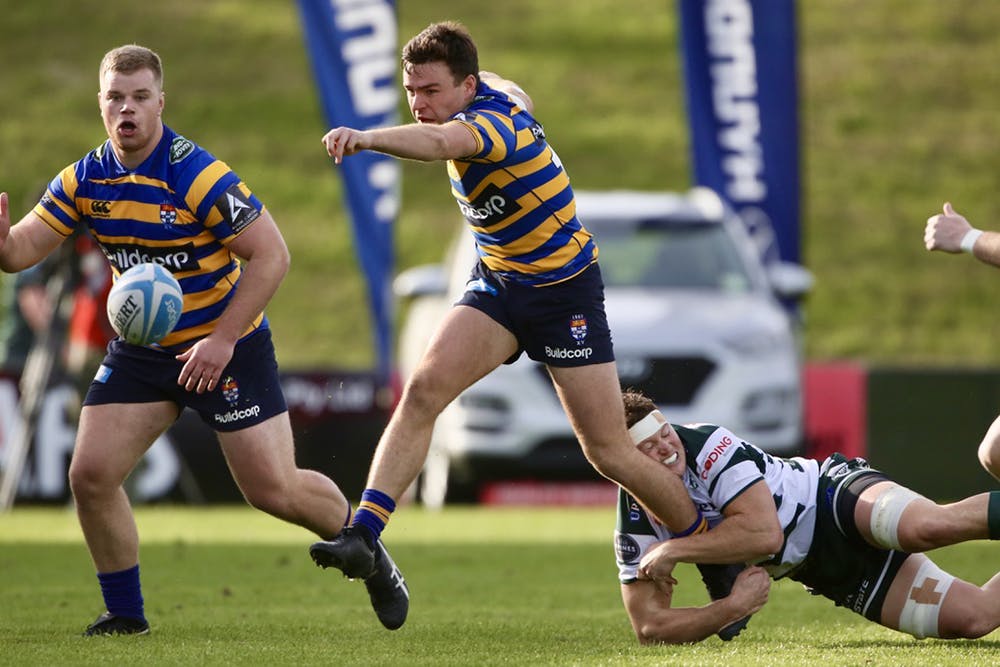 Students put boot to ball against Warringah in Round One 2020. Photo: AJF Photography
