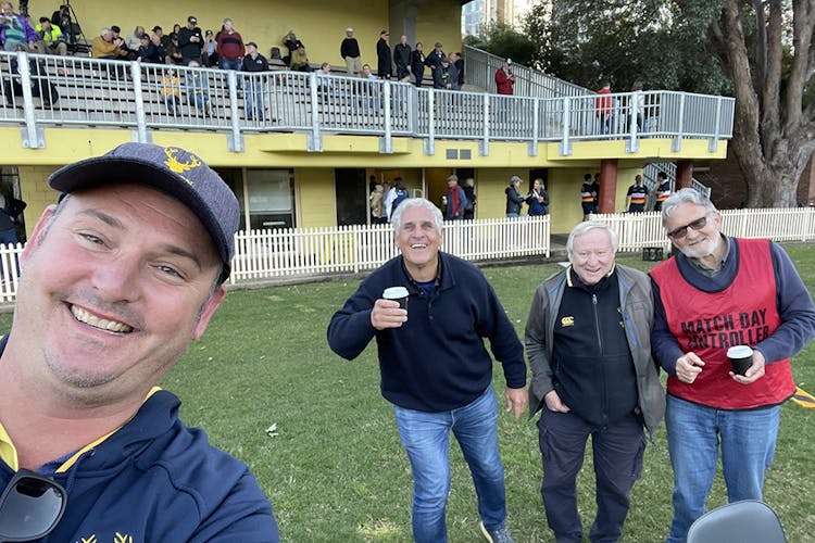Tim Carroll alongside friends on Gordon matchday. Photo: Gordon Rugby Media